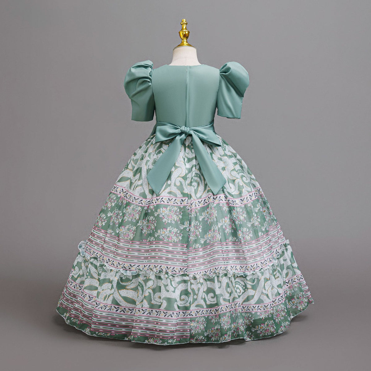 Sage Green printed chiffon girls princess gown back view with sash bow, designed for birthday parties.