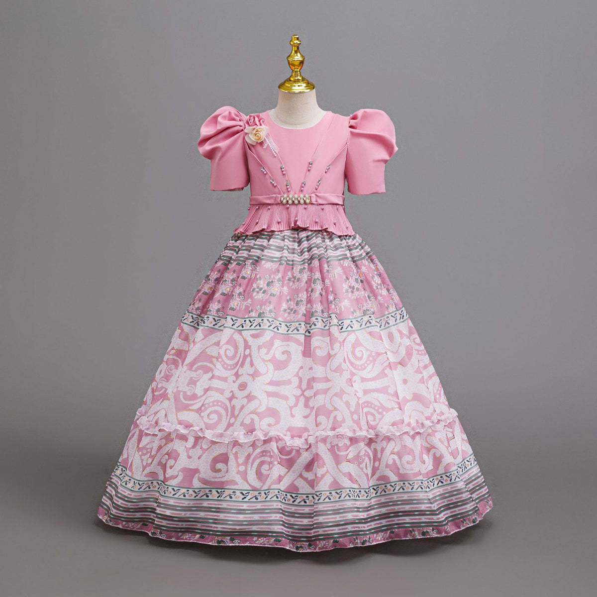 Dusty Pink printed chiffon girls princess gown with puff sleeves, pearl belt and tiered skirt, designed for birthday parties.
