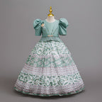 Sage Green printed chiffon girls princess gown with puff sleeves, pearl belt and tiered skirt, designed for birthday parties.