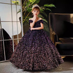 Purple sequin girls party dress photographed against a dark backdrop, front view 2.