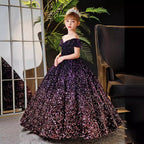 Purple ombre sequin princess dress for girls shading to rose gold at the hem, angled view.