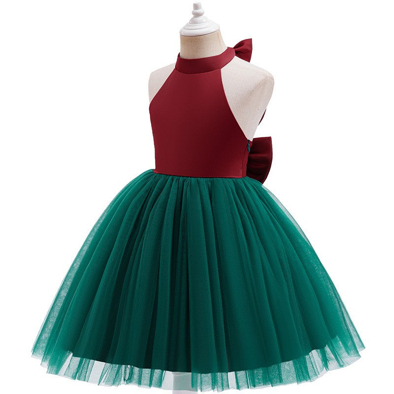 Red and green tulle girls Christmas dress with a halter bodice and full tutu skirt, front view, for a holiday party.