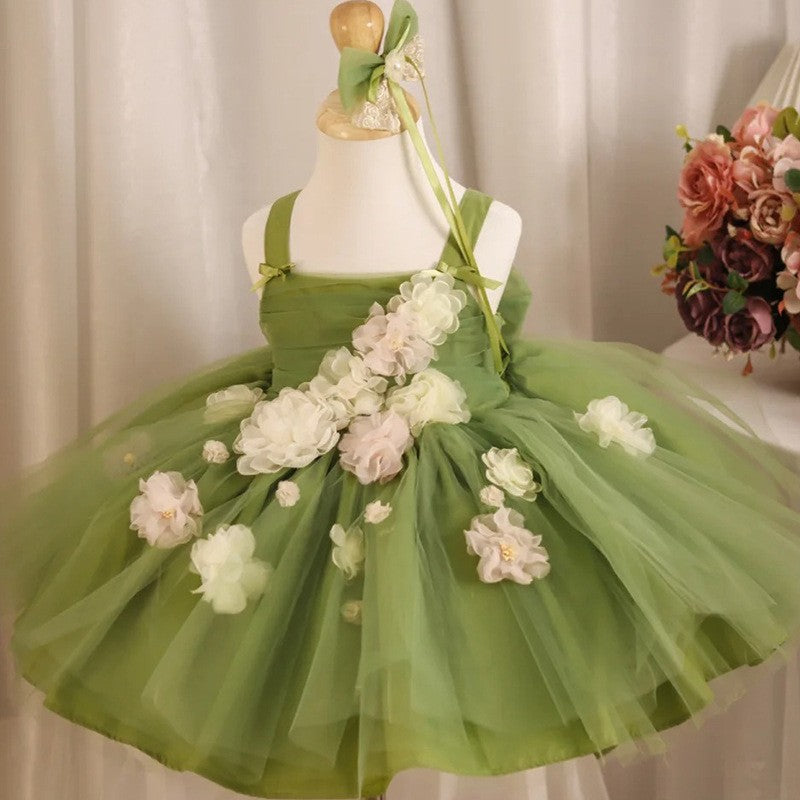 Sage green tulle princess dress for girls with ivory 3D flowers down the bodice, front view, for birthdays and weddings.