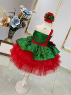 Back view of the green and red sequin girls tutu dress with a red one-shoulder strap, designed for Christmas parties.