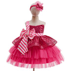 Hot pink sequin girls tutu dress with a candy-stripe bow and tiered tulle skirt, designed for Christmas parties.