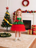 Green and red sequin and tulle girls tutu dress with a red satin bow and one-shoulder strap, designed for Christmas parties.