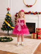 Hot pink sequin and tulle girls tutu dress with a candy-stripe bow and one-shoulder strap, designed for Christmas parties.