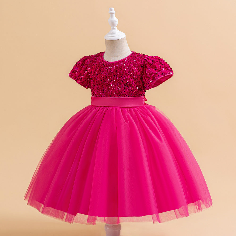 Fuchsia sequin girls party dress with tulle skirt and satin waistband, designed for birthdays and holidays.