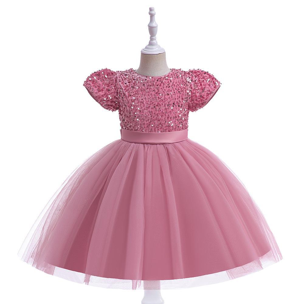 Dusty Pink sequin and tulle girls party dress with short puff sleeves, satin waistband and back bow, designed for birthdays and holiday parties.