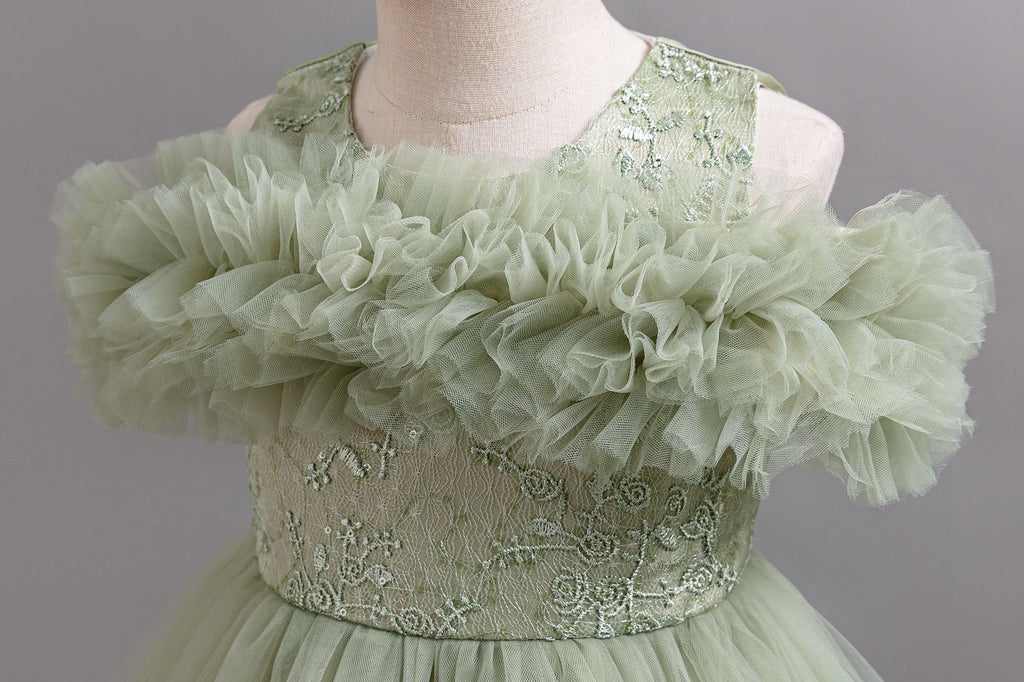 Sage Green tulle girls ball gown with ruffled off-shoulder band and embroidered lace waist, designed for flower girls and weddings.