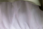 Sage Green tulle girls ball gown tulle layers close-up, designed for flower girls and weddings.