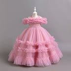 Pink tulle girls ball gown with ruffled off-shoulder band, lace waist and tiered ruffle skirt, designed for flower girls and weddings, view 3