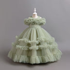 Sage Green tulle girls ball gown with ruffled off-shoulder band, lace waist and tiered ruffle skirt, designed for flower girls and weddings, view 3