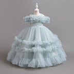 Dusty Blue tulle girls ball gown with ruffled off-shoulder band, lace waist and tiered ruffle skirt, designed for flower girls and weddings.