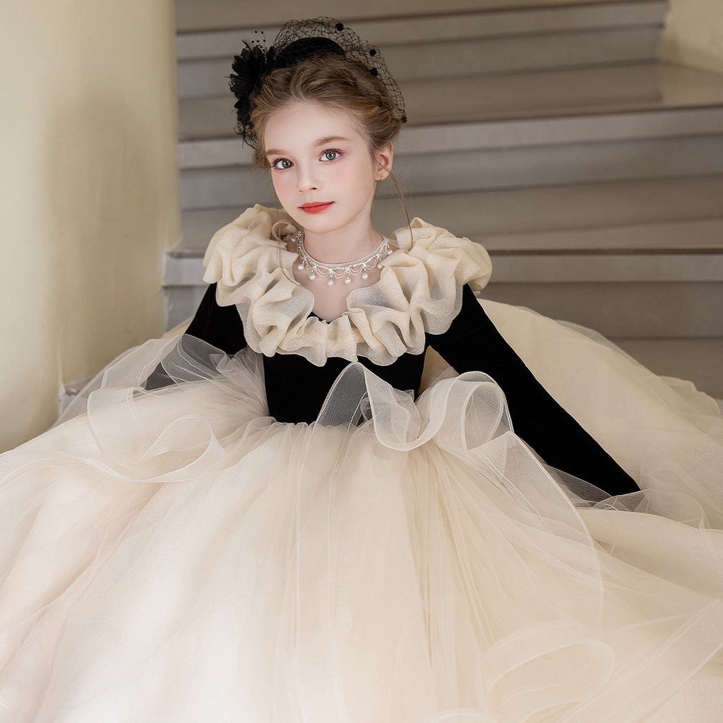 Champagne organza princess dress for girls with a sweeping skirt, full length view.