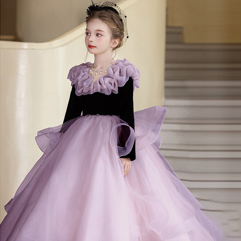 Purple organza girls formal dress with a black velvet bodice and lilac ruffled collar, front view.