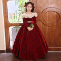 Red velvet princess dress for girls with a cream ruffled collar, front view, for a piano recital.