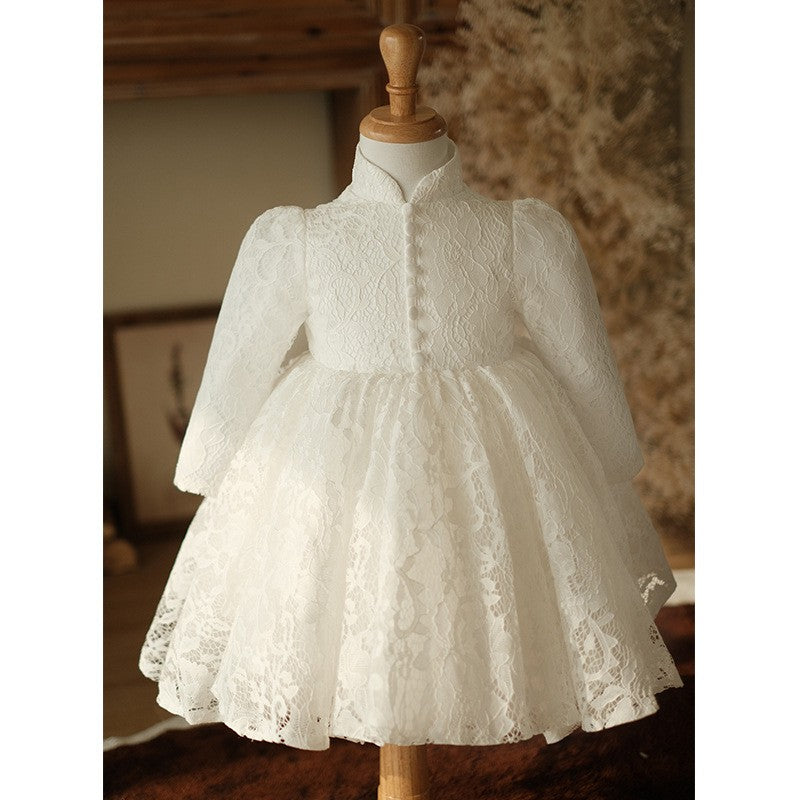 Ivory lace flower girl dress with a mandarin collar and covered buttons, front view, for weddings.