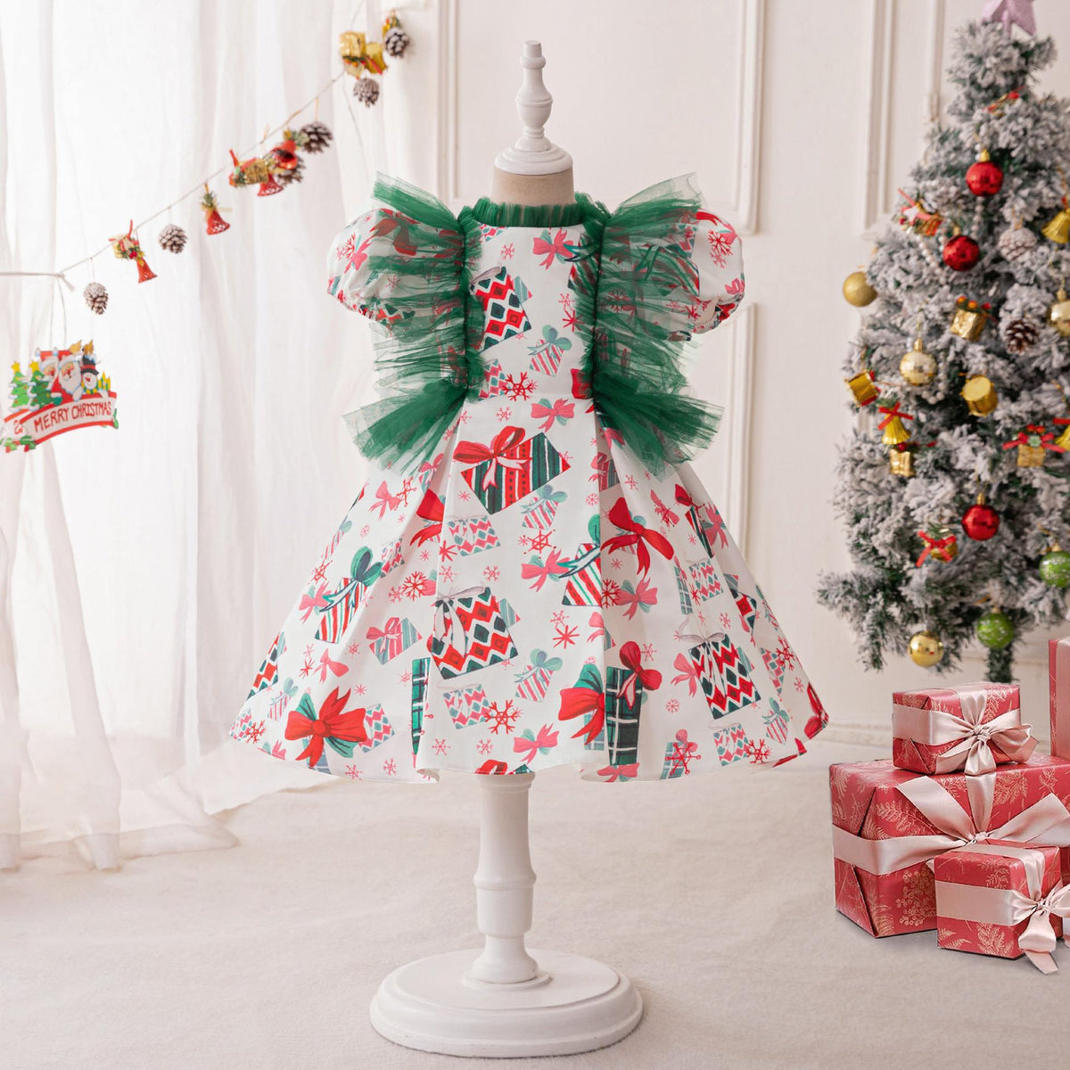 White satin girls Christmas dress front view with gift box and bow print, designed for Christmas celebrations.