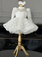 White lace girls princess dress with long puff sleeves, mock neck and 3D rosette tulle skirt, designed for birthdays and weddings.