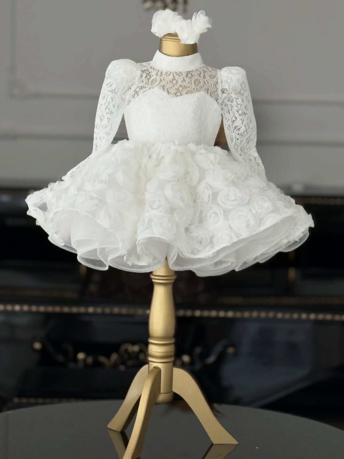 White lace girls princess dress with long puff sleeves, mock neck and 3D rosette tulle skirt, designed for birthdays and weddings.