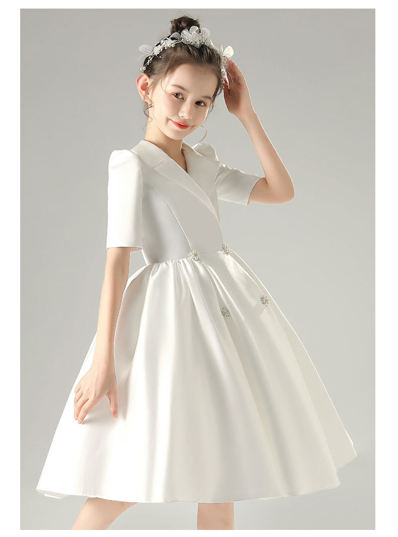 White satin girls dress with a tuxedo lapel collar, puff half sleeves and a full knee-length skirt, designed for weddings and recitals, view 10