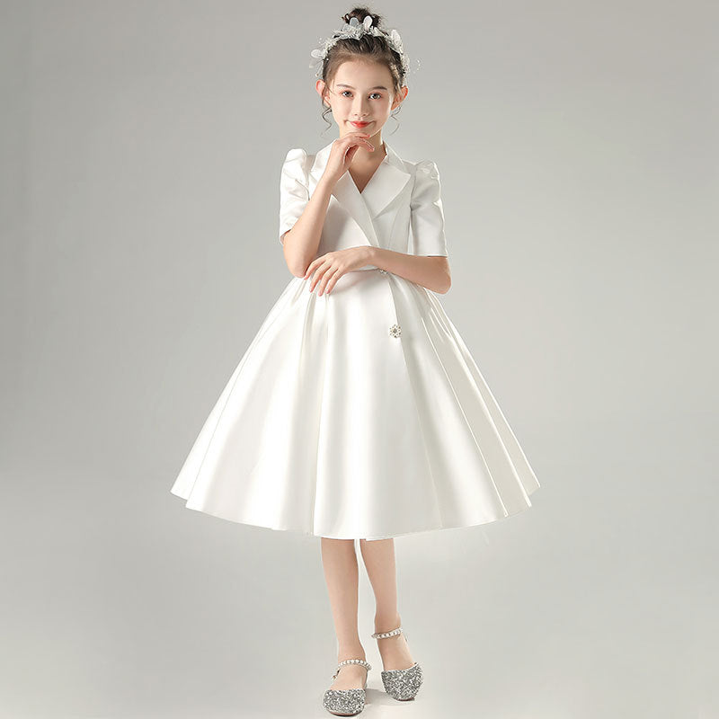 White satin girls dress with a tuxedo lapel collar, puff half sleeves and a full knee-length skirt, designed for weddings and recitals, view 2