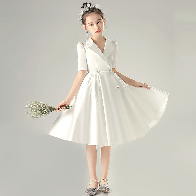White satin girls dress with a tuxedo lapel collar, puff half sleeves and a full knee-length skirt, designed for weddings and recitals, view 3