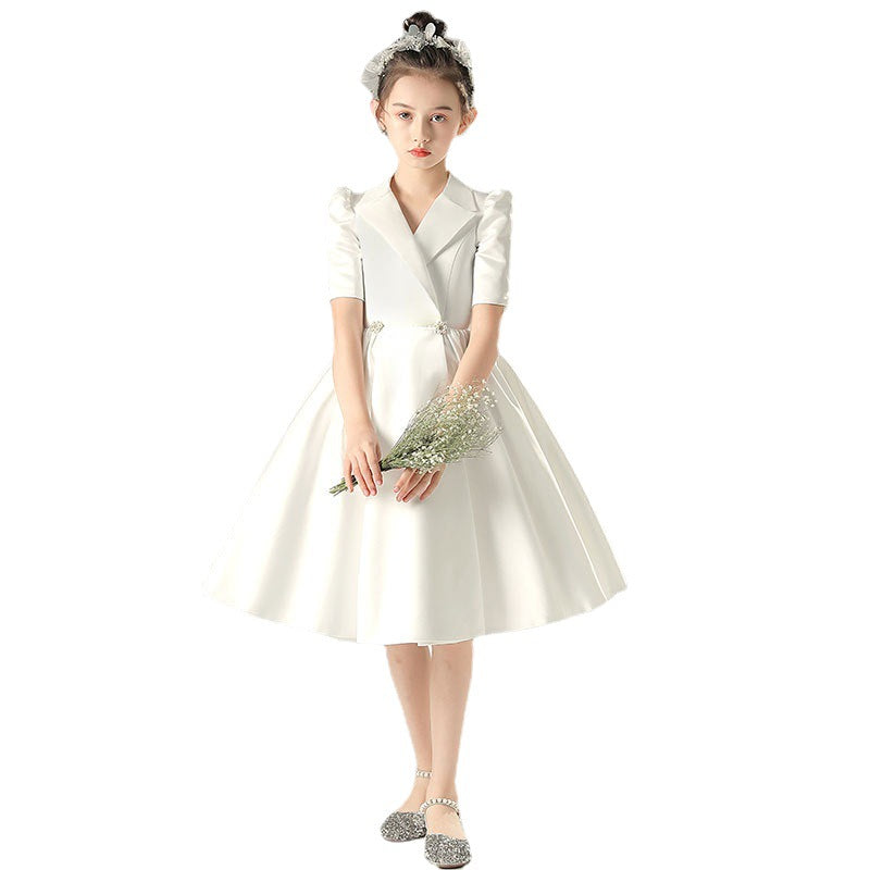 White satin girls dress with a tuxedo lapel collar, puff half sleeves and a full knee-length skirt, designed for weddings and recitals, view 5
