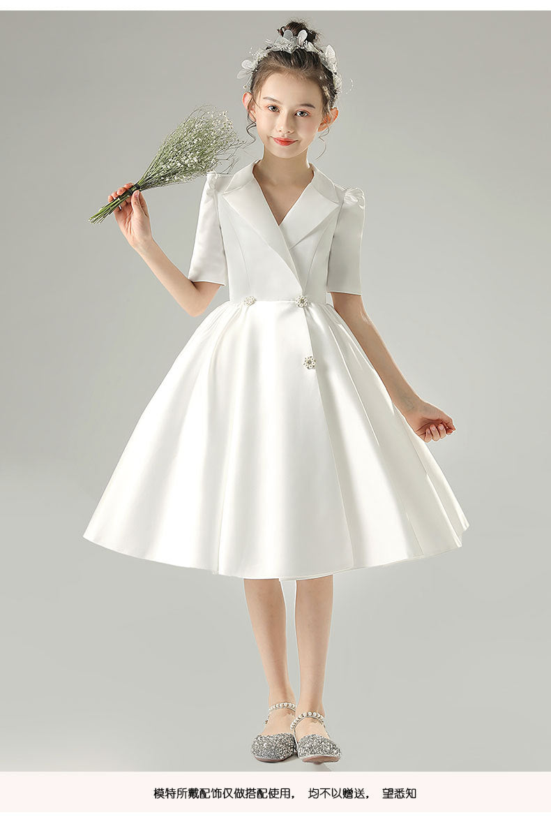 White satin girls dress with a tuxedo lapel collar, puff half sleeves and a full knee-length skirt, designed for weddings and recitals, view 8