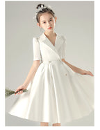 White satin girls dress with a tuxedo lapel collar, puff half sleeves and a full knee-length skirt, designed for weddings and recitals, view 9