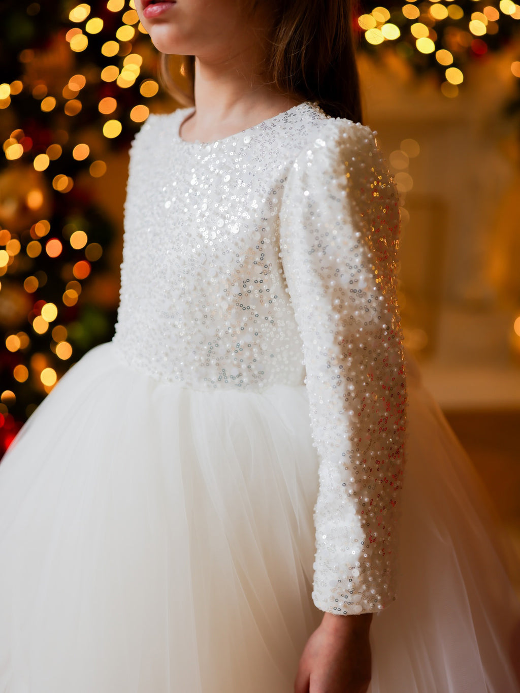White sequin girls tutu dress with long sleeves, heart open back and satin bow, designed for Christmas and weddings, view 2