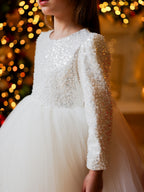 White sequin girls tutu dress with long sleeves, heart open back and satin bow, designed for Christmas and weddings, view 2